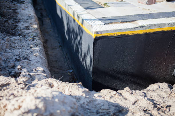 Professional Waterproofing technician working in Saint Paul Park, MN